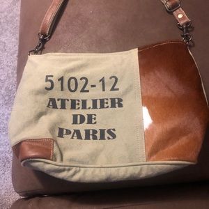 Like New Myra  purse only used 2 times sz 14”x10” adjustable strap